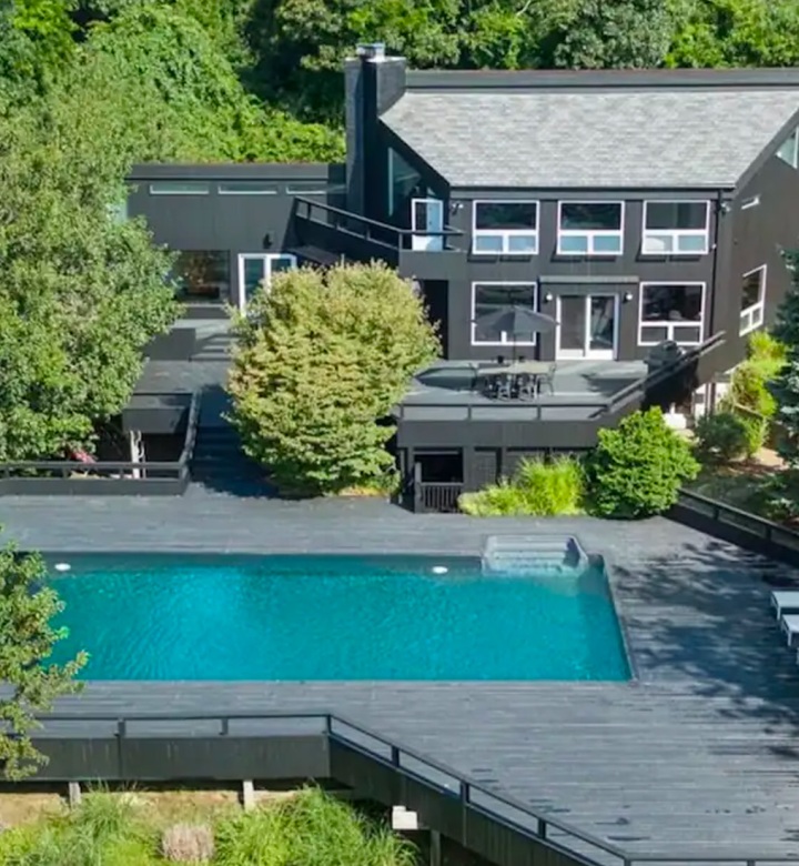 Best Airbnbs in the Hamptons - An overhead shot of a large Hamptons house with large backyard and pool.