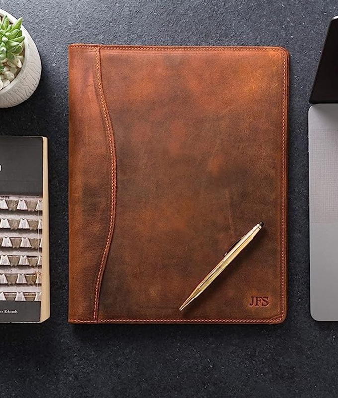 Best Last-Minute Father's Day gifts: A brown leather portfolio on a desk