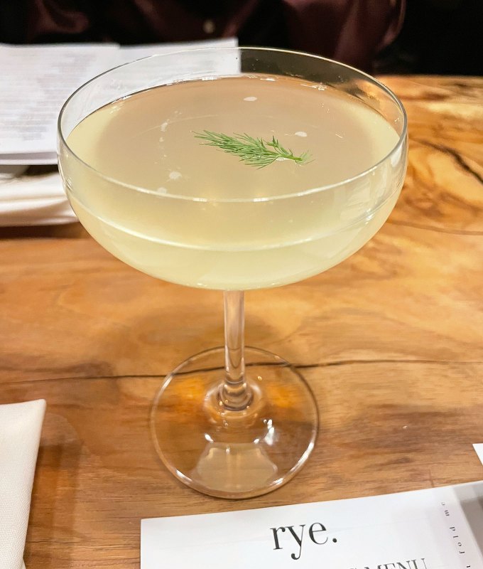 restaurant trends 2023: coupe glass with celery-dill cocktail inside